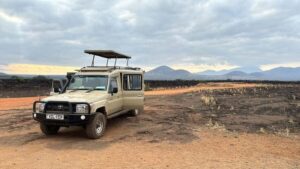 From Nairobi: 4-Day Maasai Mara and Lake Nakuru Group Safari - Rift Valley viewpoint and volcanic peaks before Maasai Mara