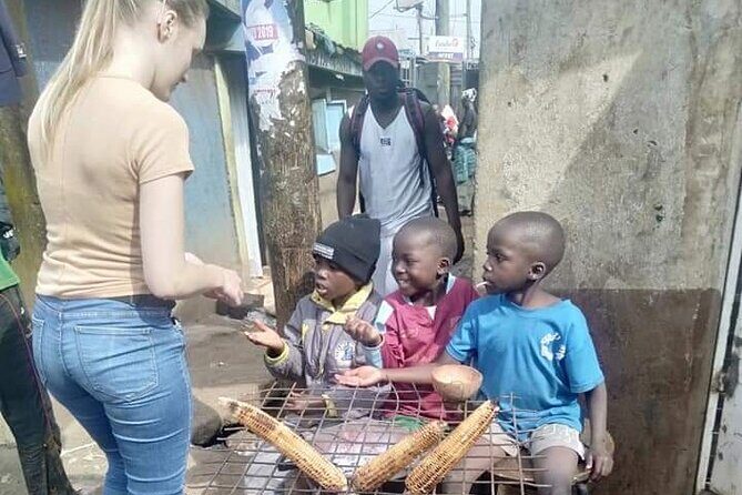 Kibera Chocolate City Tour - Walking By the Historical Railway: A Bigger View of Kibera