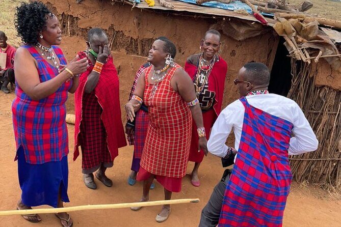 Maasai Village Experience Day Tour - Inside the manyatta: ugali, goat milking, beadwork, and dancing