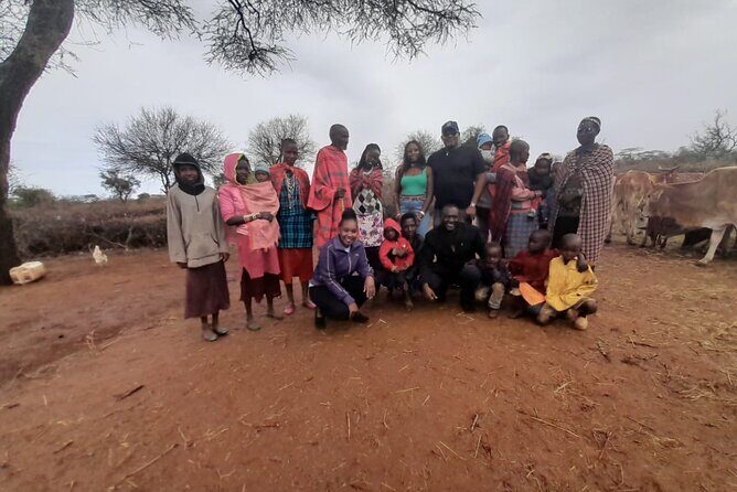 Masai village day tour. - Village Visit Highlights: Welcome Dance, Homes, Fire, and School