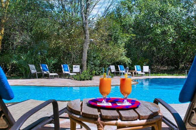 Samburu/ Aberdare/ Lake Nakuru/ Masai Mara 7 Days Safari - Aberdare National Park: watching from the Treetops waterhole deck