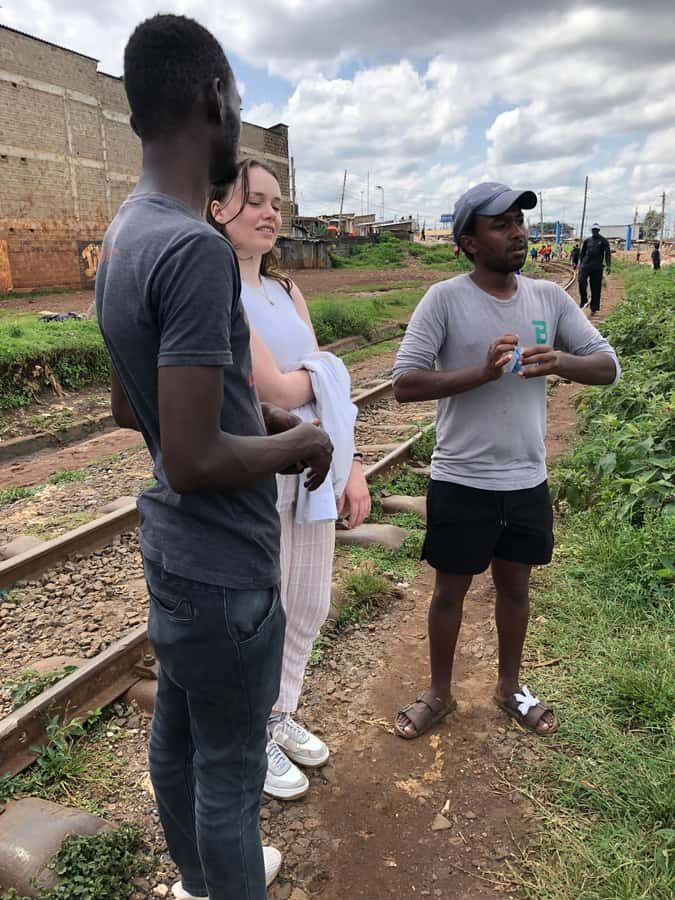vibrant kibera slum tour - Learning with Daniel and Elijah: history, daily life, and why safety matters